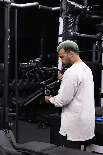 Person operating a professional camera rig.